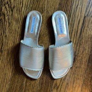 Brand-new Manolo Blahnik gold slides.